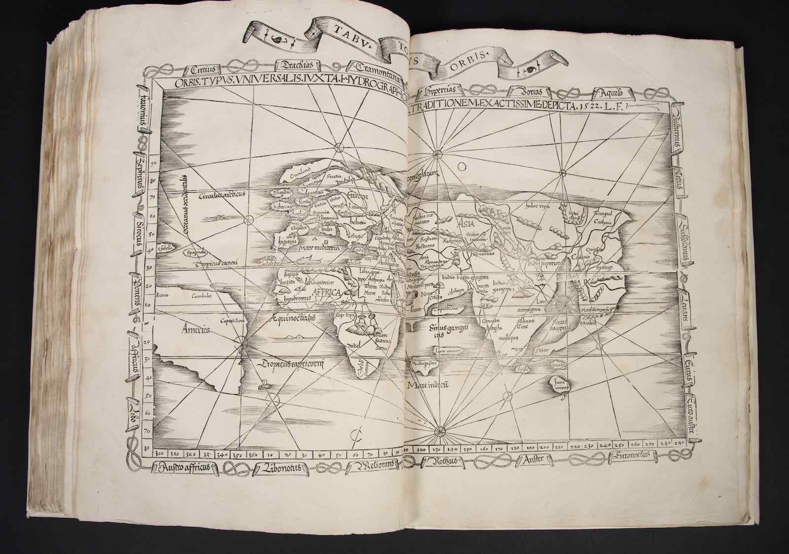 An image of a map surrounded by woodcut border featuring one of the first printed instances of “America.”