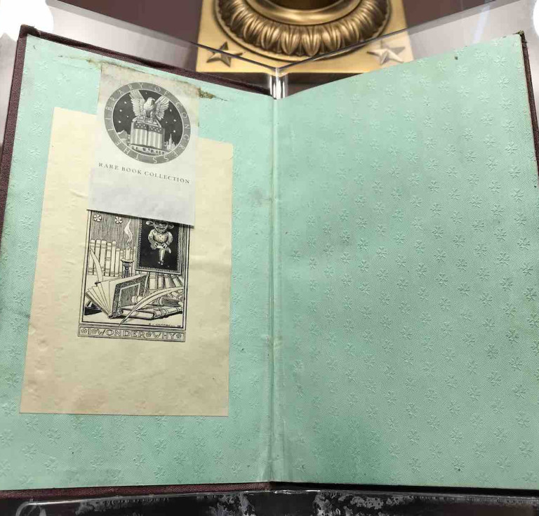 The bookplates of both Carolyn Wells (under) and the Library of Congress (over) in a first edition of Walt Whitman’s Memoranda of the War that Carolyn bequeathed to the library upon her death in 1942. 