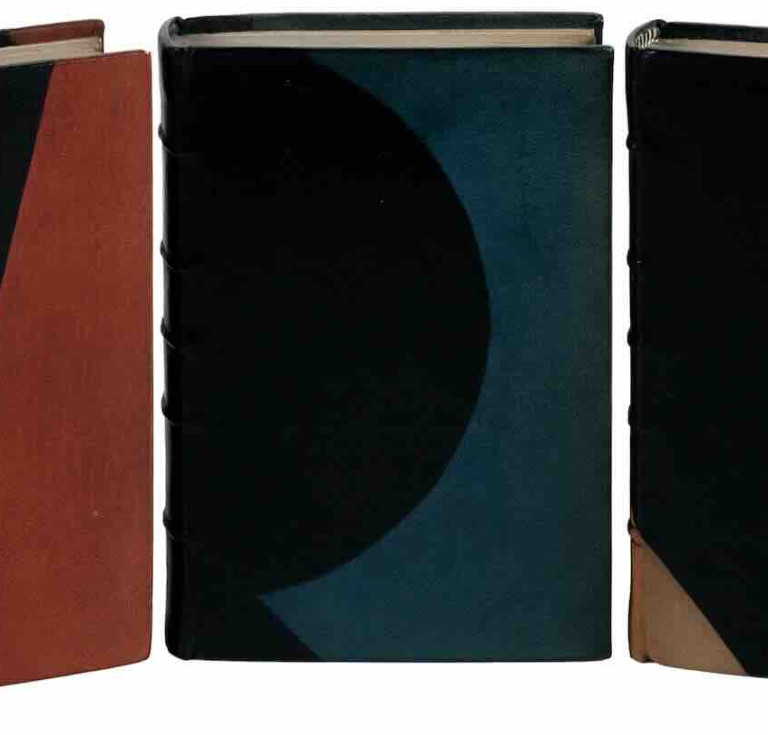 Three books by John Dos Passos and finely bound by Hazel Dreis